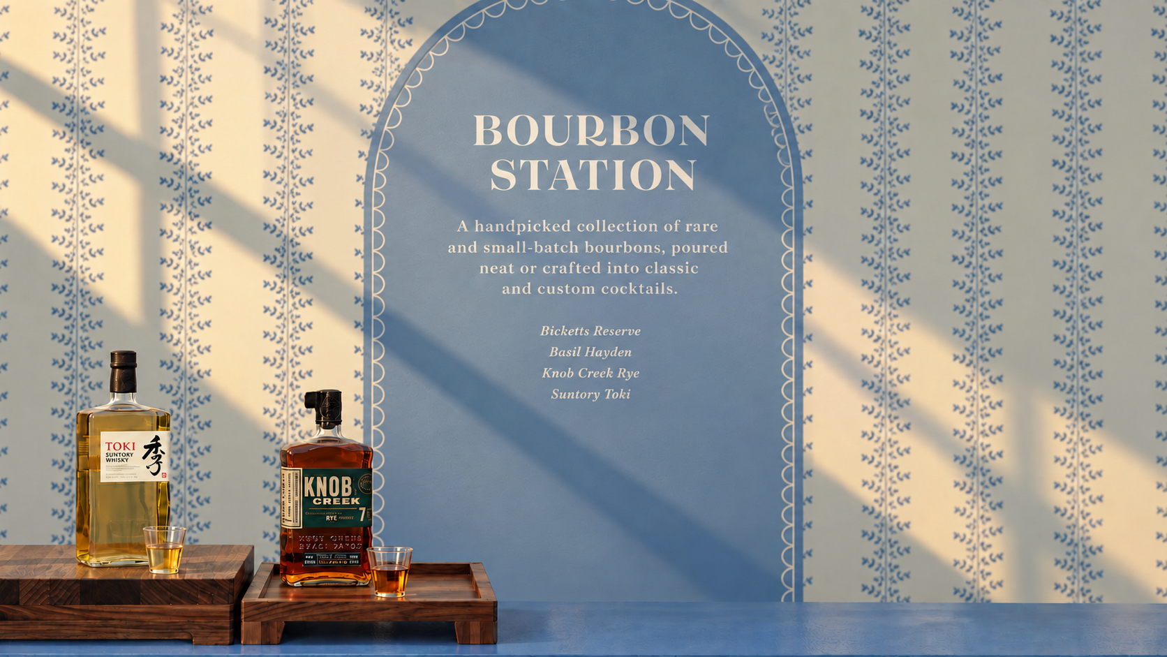 Bourbon station with a painted blue arch and custom signage